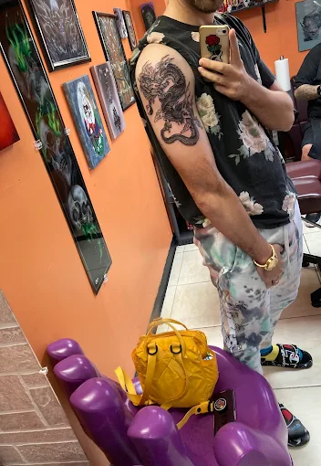 Color Bomb Tattoo Shop and Body Piercing